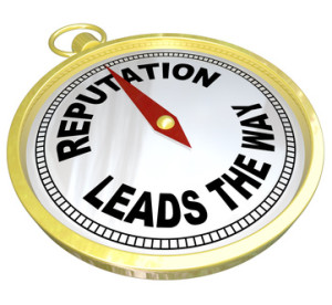 A gold compass with the words Reputation Leads the Way to symbolize trustworthiness, credibility and popularity -- important traits for a leader